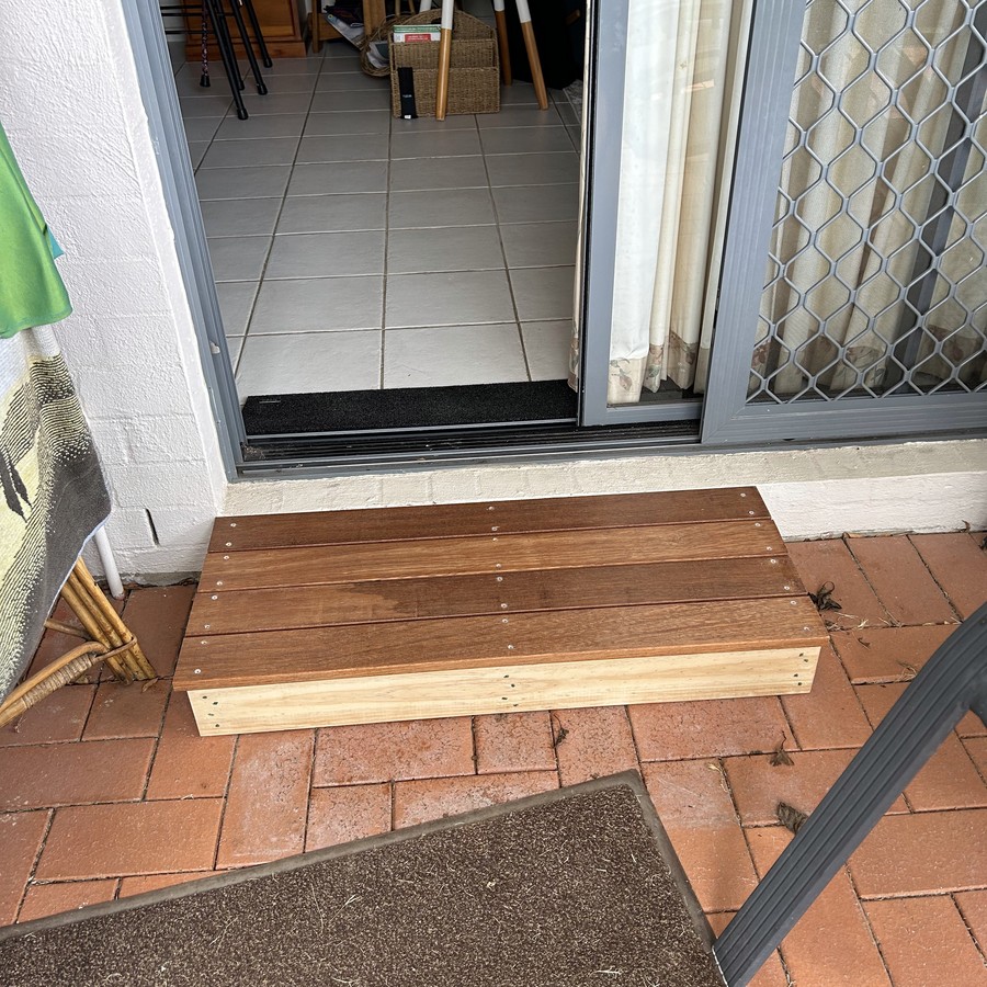 Timber threshold ramp at an internal doorway