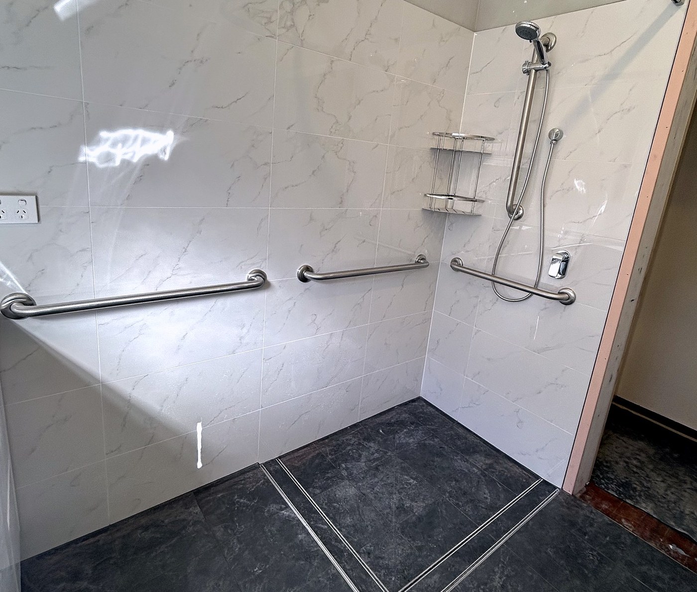 Grab rails installed in a walk-in shower, Sydney