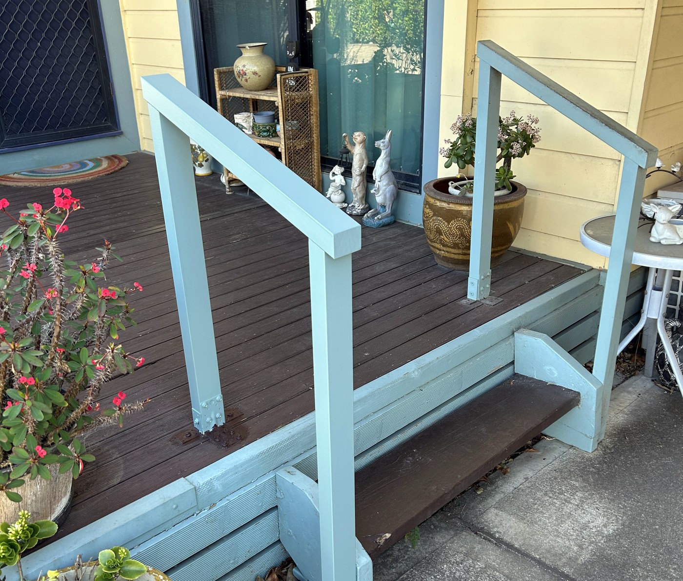 Timber entry deck and steps with handrails at a Sydney home