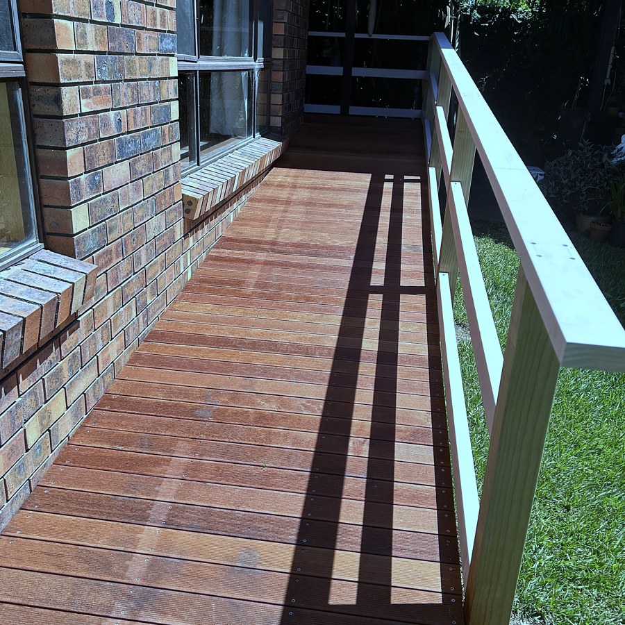 Timber access ramp with stainless steel handrails