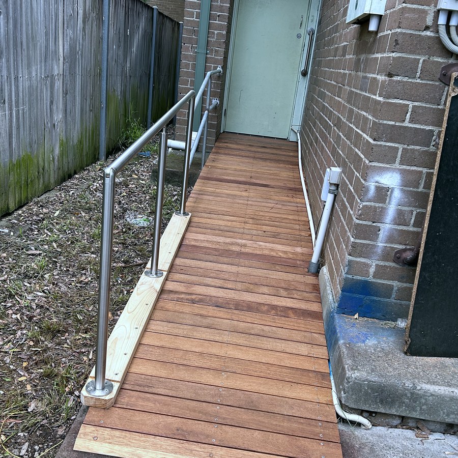 Timber access ramp with stainless steel handrails