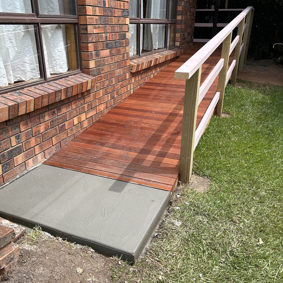 Timber access ramp with a timber balustrade