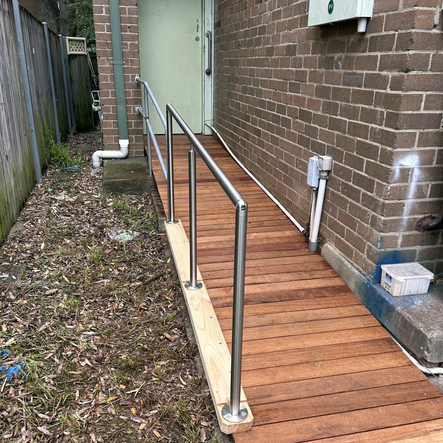 Timber access ramp with stainless steel handrails